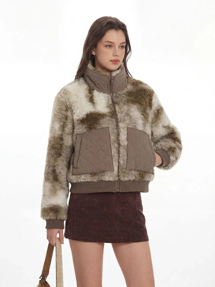 Close-up of the woman's face and the details of the faux fur jacket