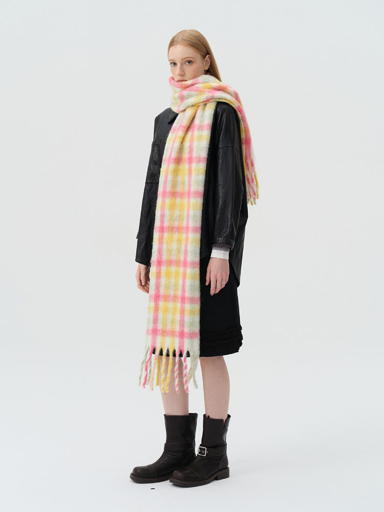 woman wearing pink and yellow plaid oversized wool blend scarf