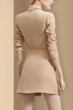 Back view of a tan blazer dress