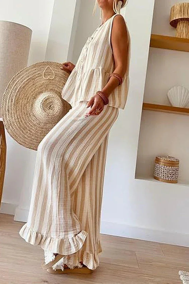 Side view of a woman in a striped linen blend set