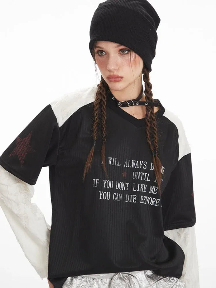 Close-up of the graphic print on the black and white long sleeve t-shirt.