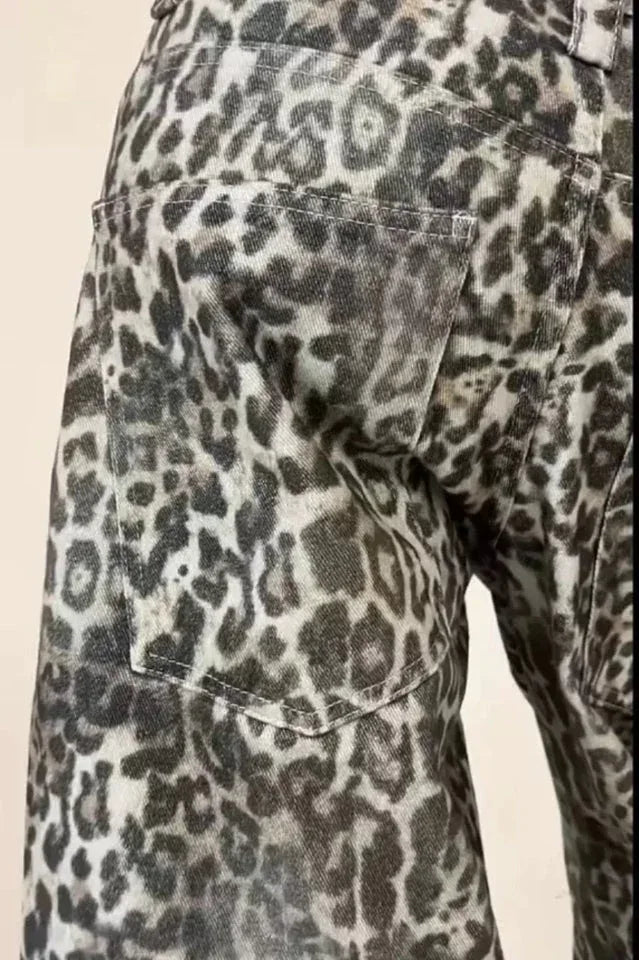 Rear view of leopard print wide leg jeans showing back pockets.