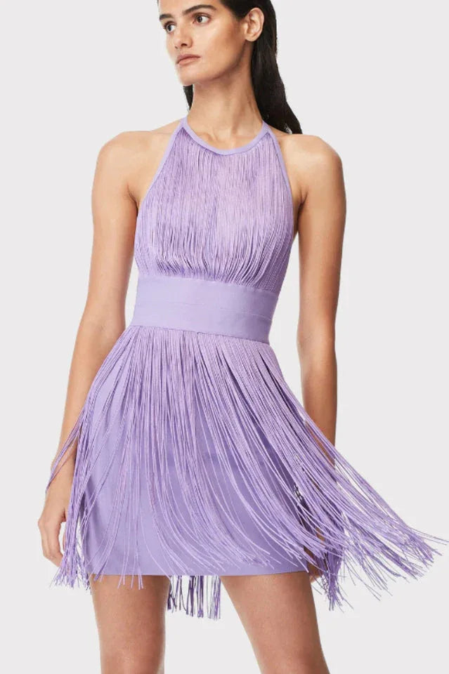 woman wearing a lavender mini dress with fringe detailing and a halter neckline Main image