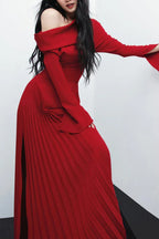Red formal dress with off-the-shoulder neckline and full-length bell sleeves