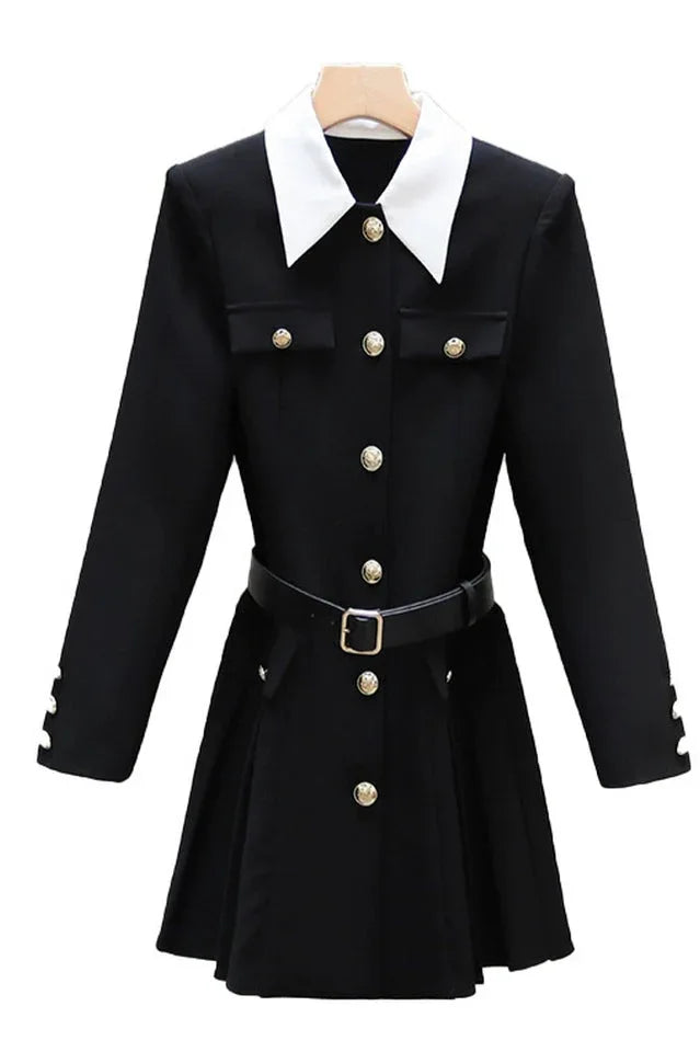 black dress with white collar and gold buttons on a hanger