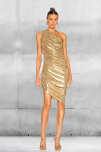 Full body shot of a woman in a metallic gold one-shoulder ruched mini dress