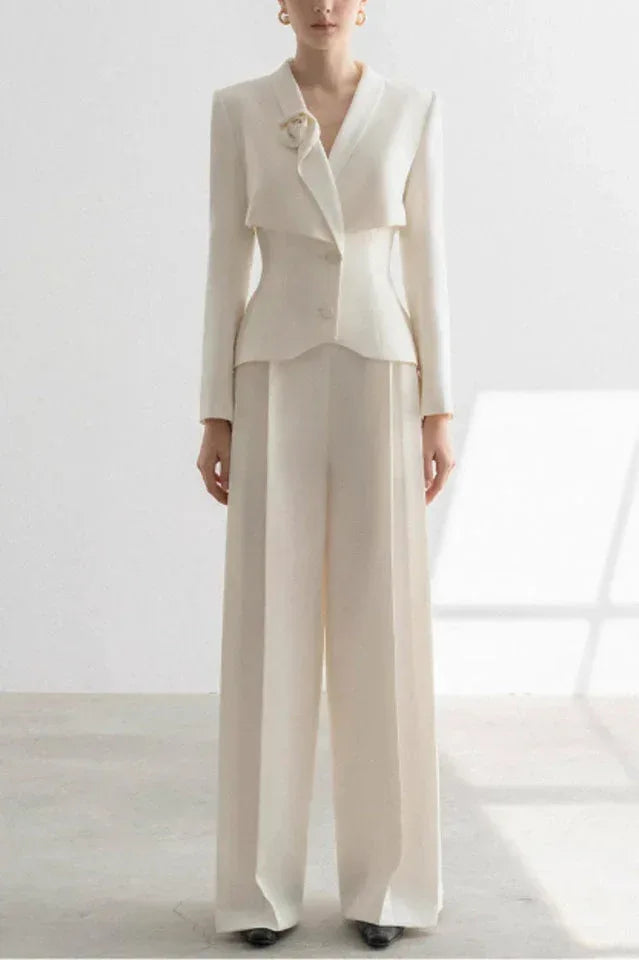 Ivory formal pantsuit with asymmetric lapel and peplum waist Main image