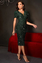 Elegant woman in a green sequined dress, showcasing the knee-length silhouette and v-neck detail.