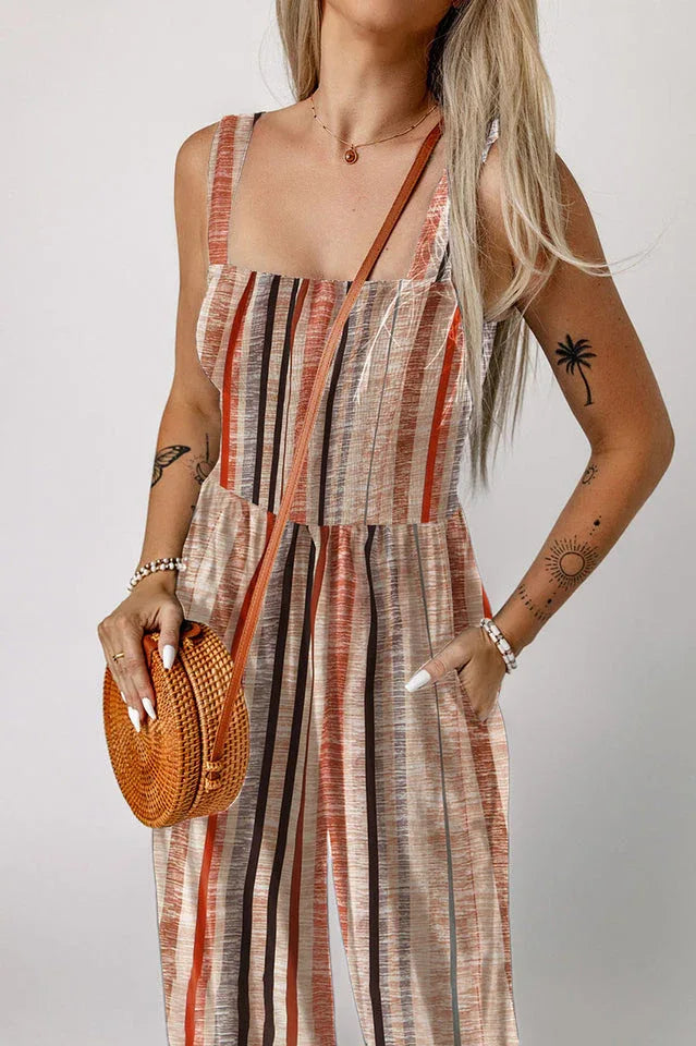 Close-up of the smocked bodice and stripe pattern on the jumpsuit
