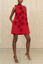 Red sleeveless A-line dress with 3D rose embellishments and pockets, worn by a model with white heels.