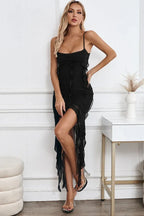 Full body shot of a woman in a black formal dress