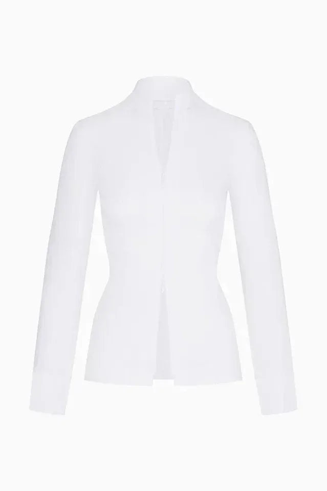 White long-sleeved top on a mannequin