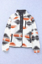 Cream fleece jacket with an orange, black, and grey geometric print, displayed flat with snap button closure, zipper pocket, and welt pockets.