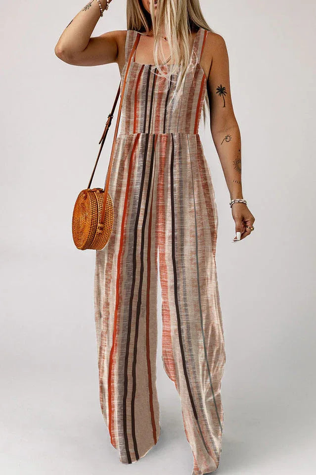 Front view of a woman in a striped jumpsuit with pockets