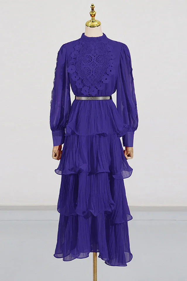 Mannequin wearing a violet tiered chiffon maxi dress with lace detail and balloon sleeves
