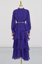 Mannequin wearing a violet tiered chiffon maxi dress with lace detail and balloon sleeves