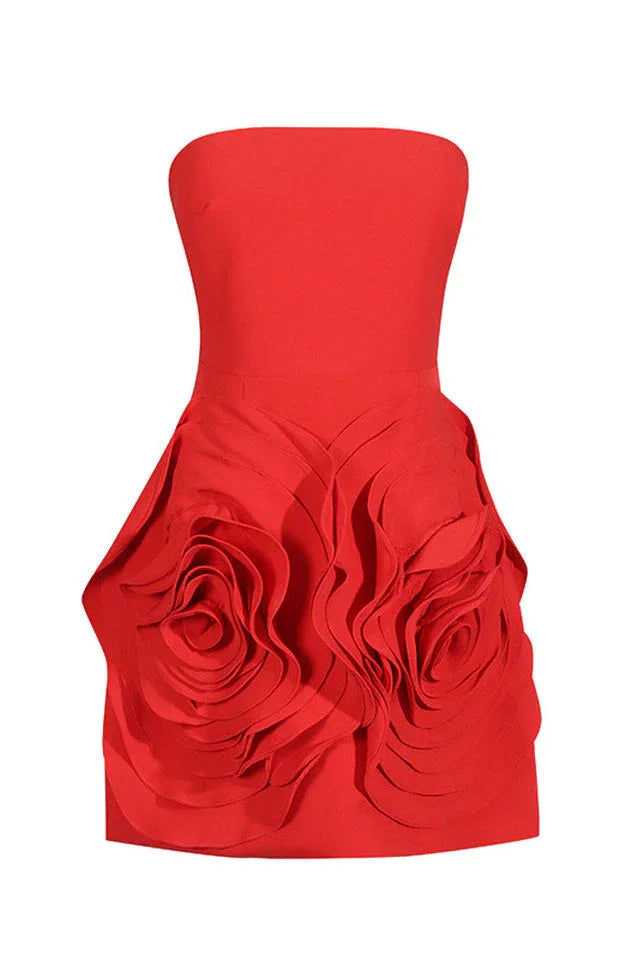 Red strapless dress with floral skirt detail on a white background