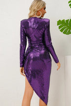 Rear view of a purple sequined long-sleeve bodycon dress with shoulder pads and an asymmetrical hem