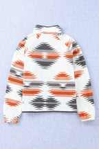 Back view of a cream fleece jacket with an orange, black, and grey geometric print, displayed flat.