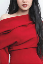 Elegant red dress featuring an off-the-shoulder design and cascading pleats