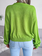 Back view of green cloud print knit cardigan