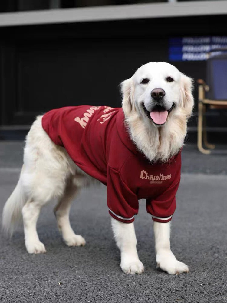 Side view of a Golden Retriever in a red fleece dog hoodie