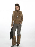 Fashionable ensemble with a mix of textures including knit, faux fur, and embroidered fabric.