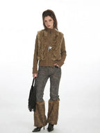 Fashionable ensemble with a mix of textures including knit, faux fur, and embroidered fabric.