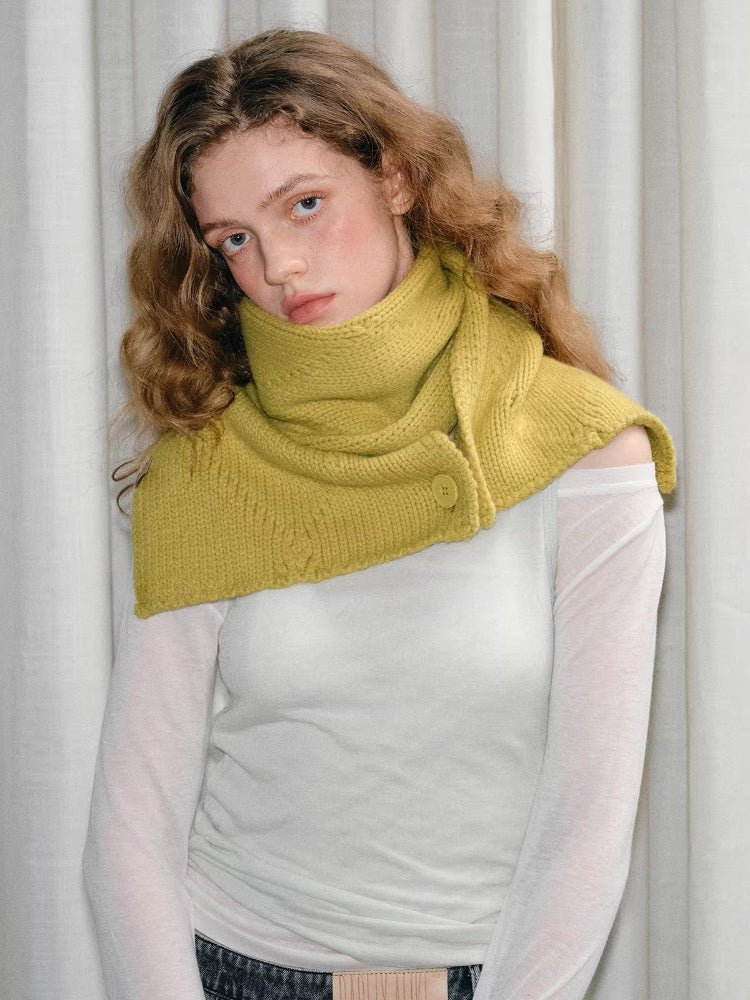 Yellow knitted scarf with button closure and wrap design