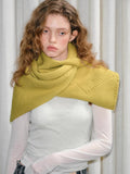 Model wearing yellow knitted wrap scarf