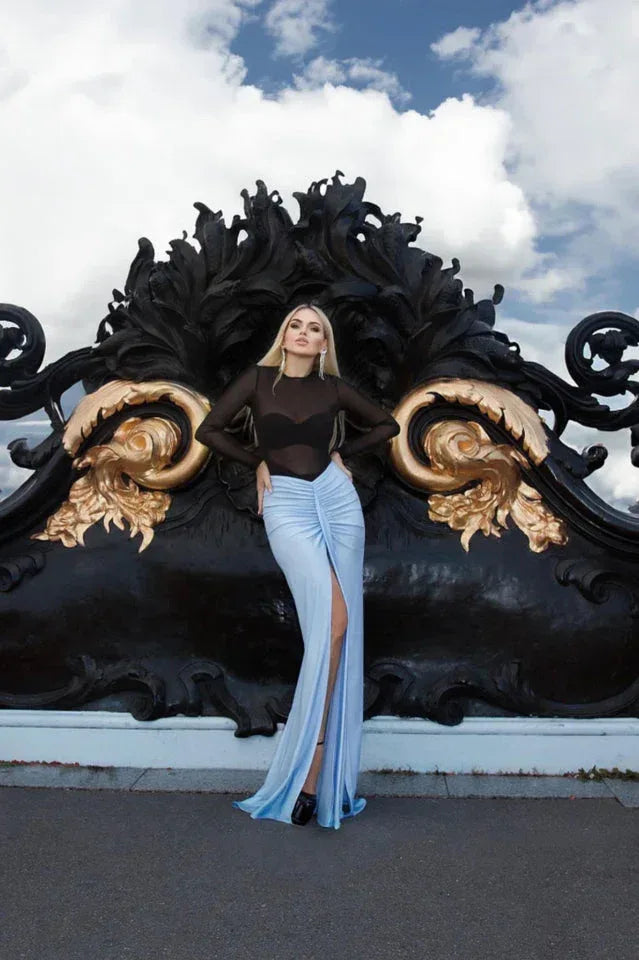Woman wearing a blue ruched maxi skirt and black long sleeve bodysuit - View 7 | WEUXS