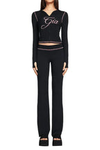 Black flared pants with contrast stitching
