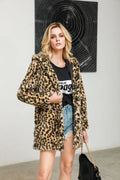 Woman in a leopard print faux fur coat
