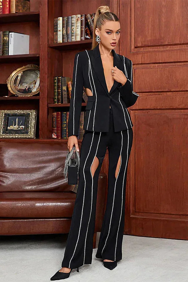Elegant women's black flare pants with crystal trim