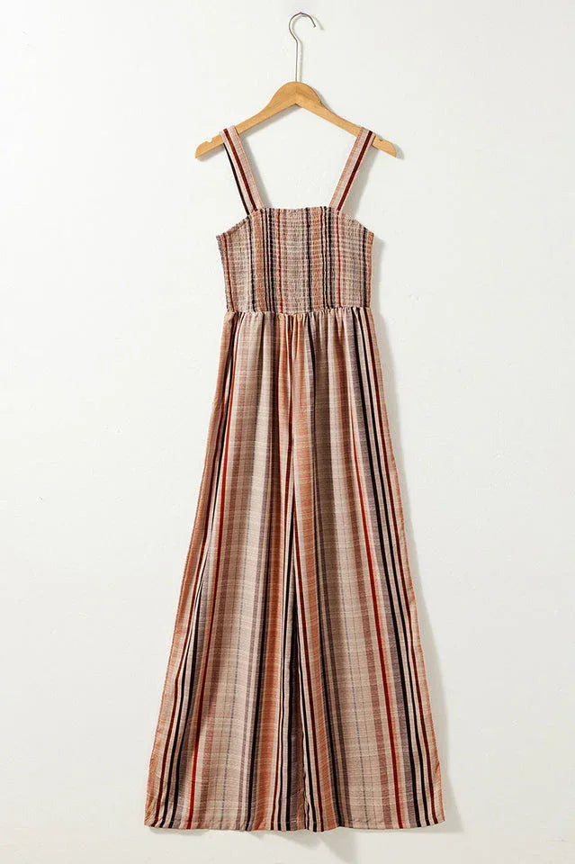 Striped wide-leg jumpsuit hanging on a hanger