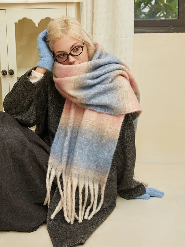 Model wearing a soft-hued gradient oversized scarf