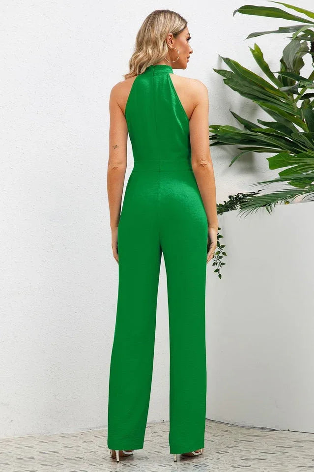 Back view of a green wide leg halter neck jumpsuit
