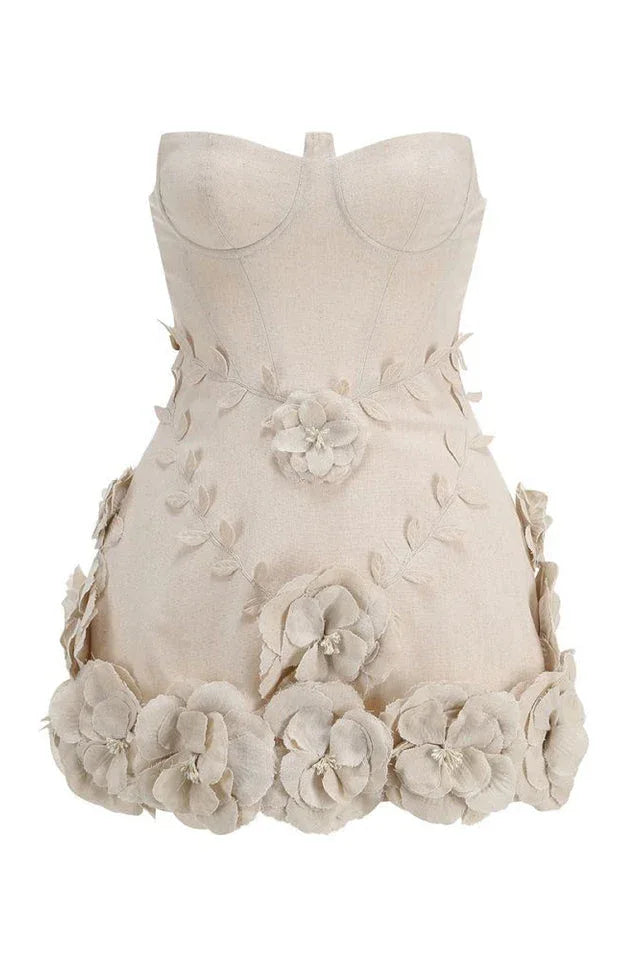 Woman adjusting the skirt of her cream corset dress