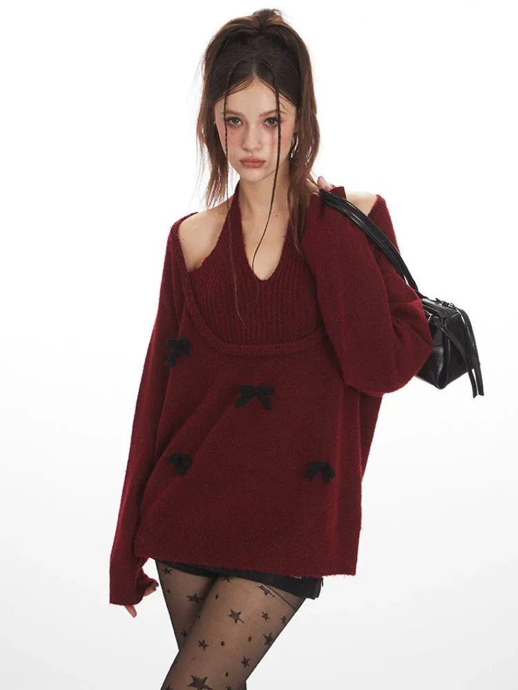 close-up of a burgundy sweater with bow details