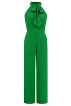 Product image of a green wide leg halter neck jumpsuit with a bow detail