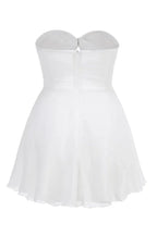 Back view of white strapless mini dress