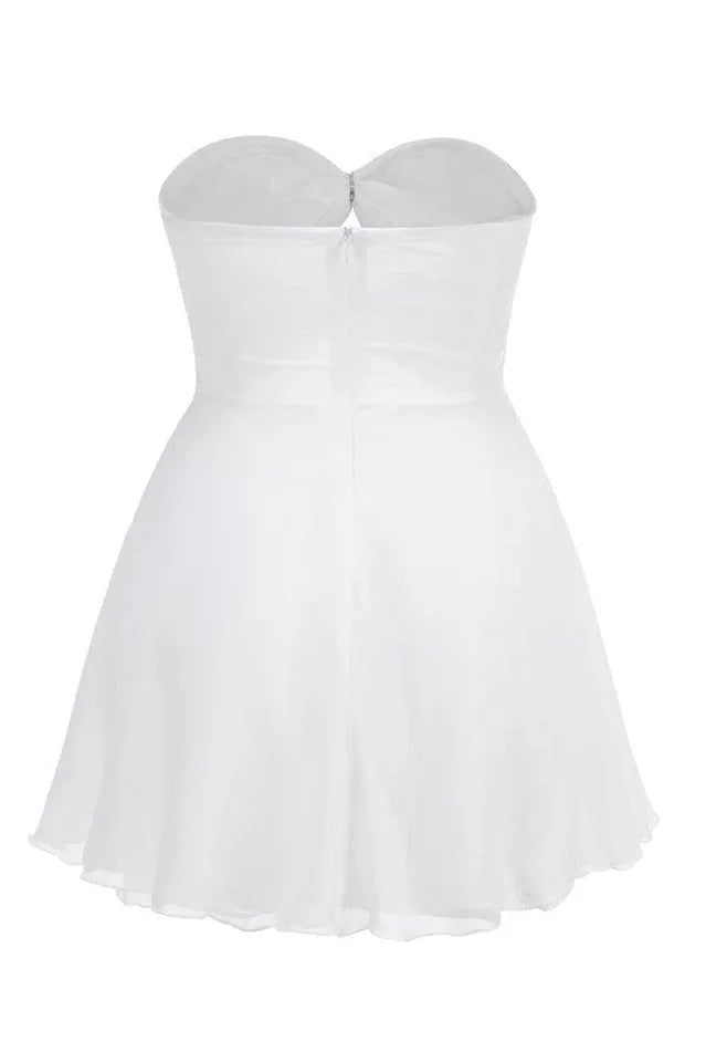 Back view of white strapless mini dress