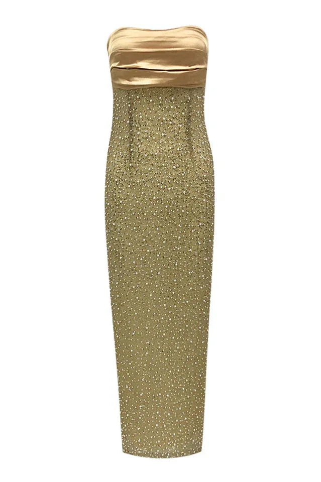 Front view of a gold strapless column gown covered in sequins and beads.