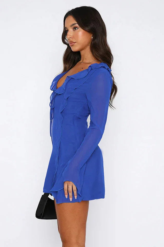 Detail of the sleeve on the royal blue sheer chiffon mini dress.