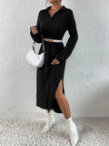 Full body shot of a model in a black ribbed knit midi dress, styled with a white belt and handbag.