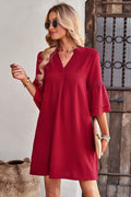 Notched Neck Flare Sleeve Pocket Dress | Dress In Beauty