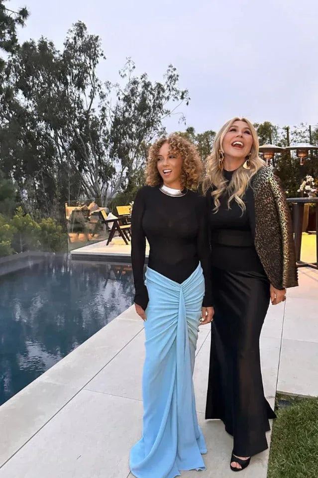 Woman wearing a blue ruched maxi skirt and black long sleeve bodysuit - View 14 | WEUXS
