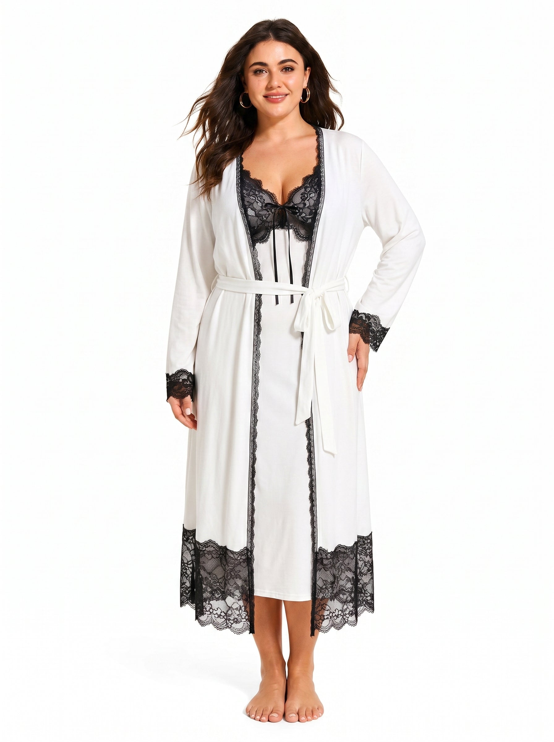 Woman wearing a white robe with black lace trim over a white slip dress with black lace top Main image