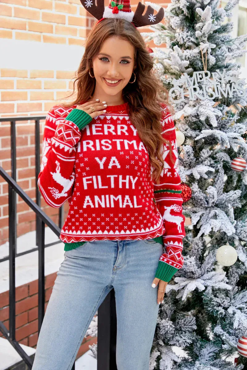 Woman wearing red Christmas sweater with reindeer and text