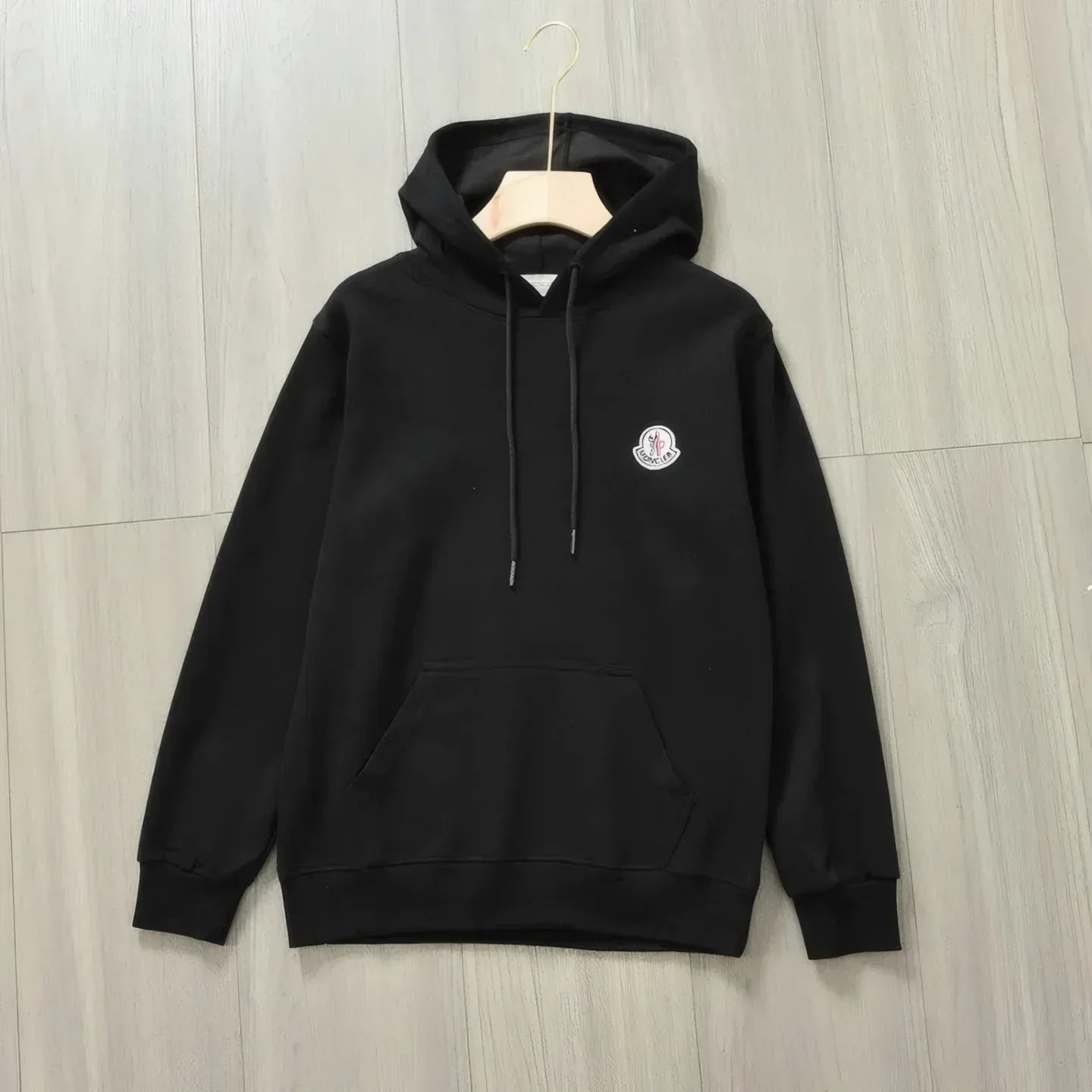 Black hooded sweatshirt with embroidered logo and kangaroo pocket Main image
